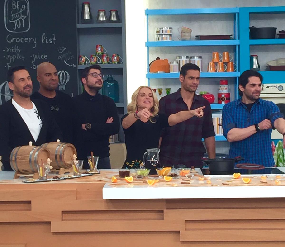 Live segment with the presenter and guests around the studio bar